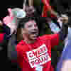 Ryan Thomas leads a cheer sqard as part of the Role of a Lifetime campaign 