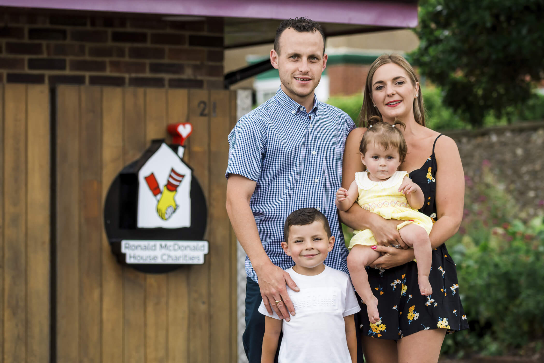 The Powell family outside a Ronal McDonald House property 