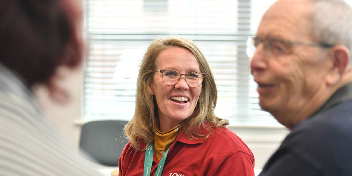 A volunteer working as part of a group