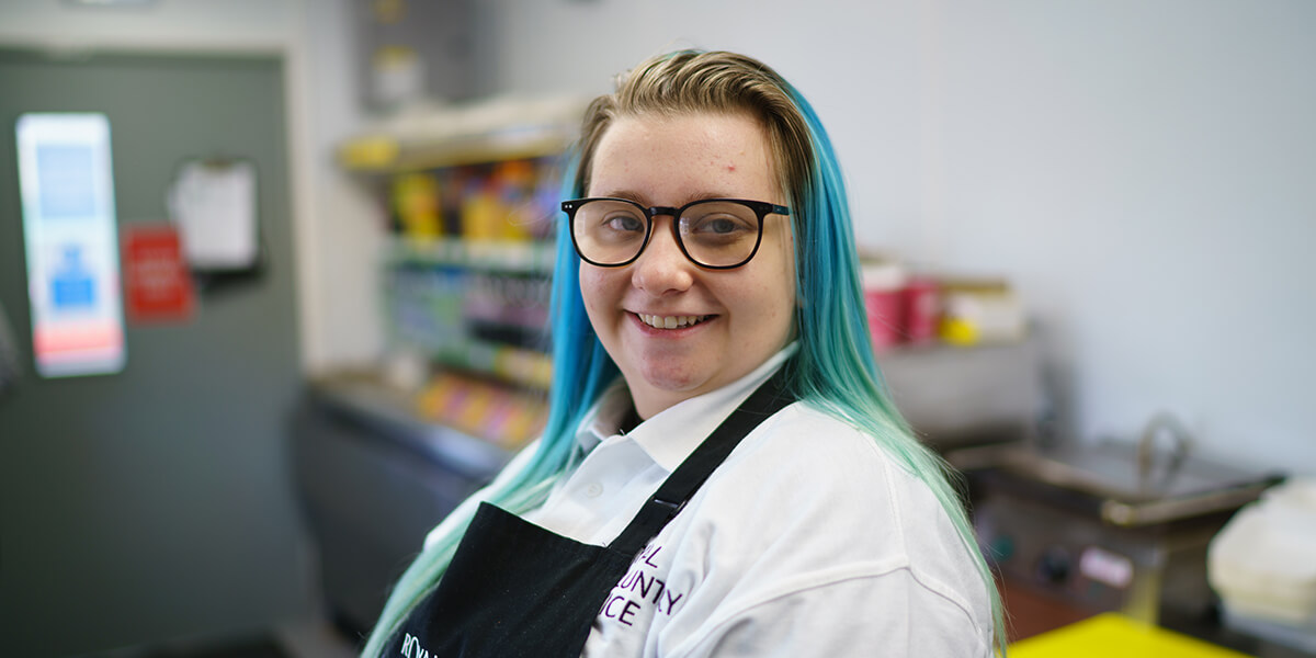 A younger hospital volunteer