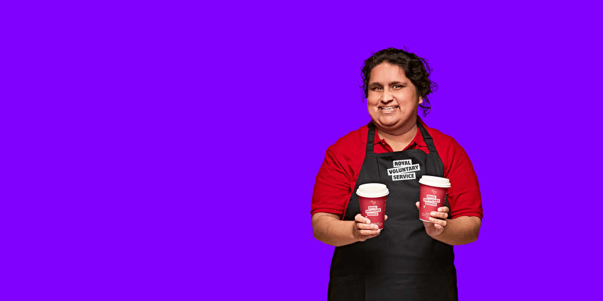 Portrait of volunteer Sejal against a purple background 